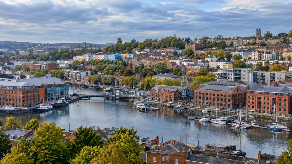 View across Bristol Floating Harbour and surrounding brick buildings